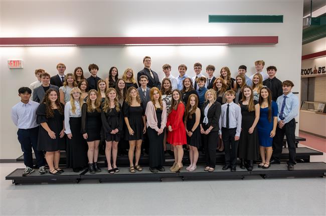  New NHS Members Smiling for a Group Photo.